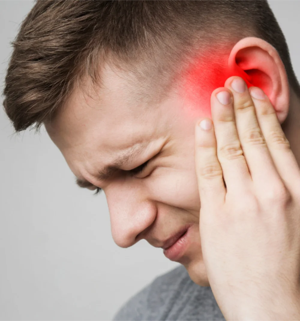 Man with sore ear with wax buildup