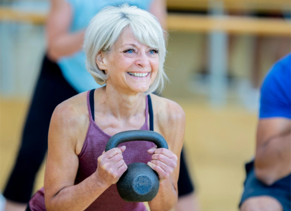 woman with hearing aid doing workout
